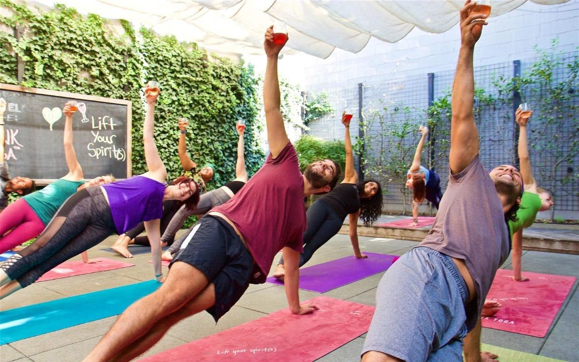 This Drunk Yoga Retreat Includes Cocktails and Astrology Readings on the Beach