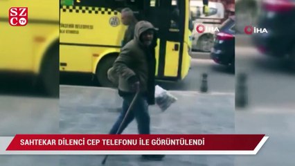 Tải video: Sahtekar dilenci cep telefonu ile görüntülendi