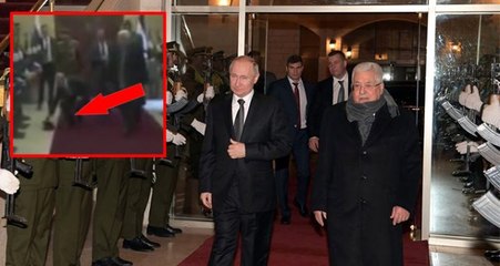 Putin, Filistinli askerin yere düşen şapkasını yerden alarak askere taktı