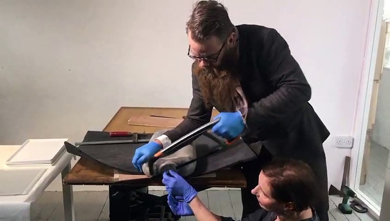 Watch as 19th century time capsule discovered in Leith Robert Burns statue is opened