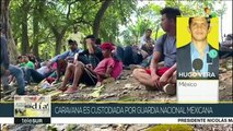 Caravana de migrantes cruza río Suchiate para entrar a México
