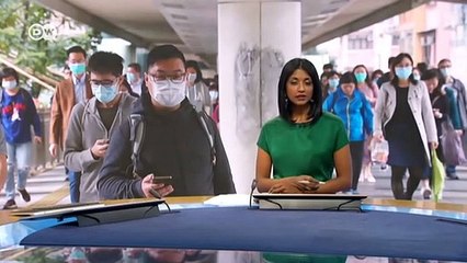 China puts millions under lockdown to contain Wuhan coronavirus - DW News