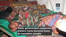 Homeless people take refuge at night shelter in Delhi’s Nizamuddin