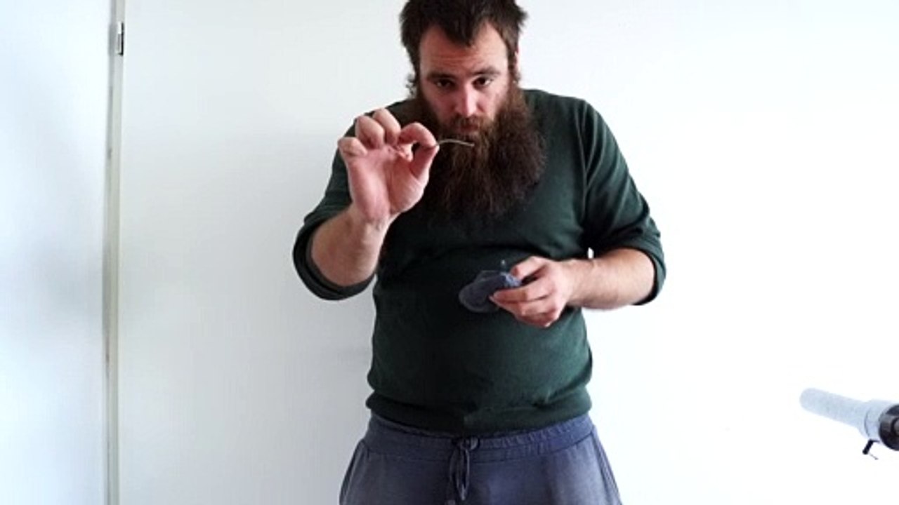 Old time strongman Bending a 3,0 x 65 mm iron nail