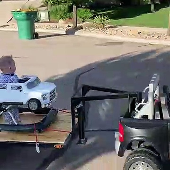 Tiny Car Towing Brother on Custom Trailer
