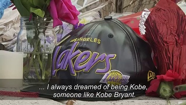 Sad day : Fans remember Kobe Bryant at his former high school