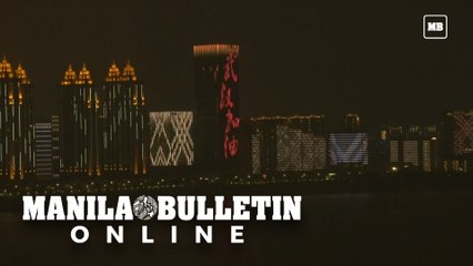China virus: Light show and words of encouragement in Wuhan