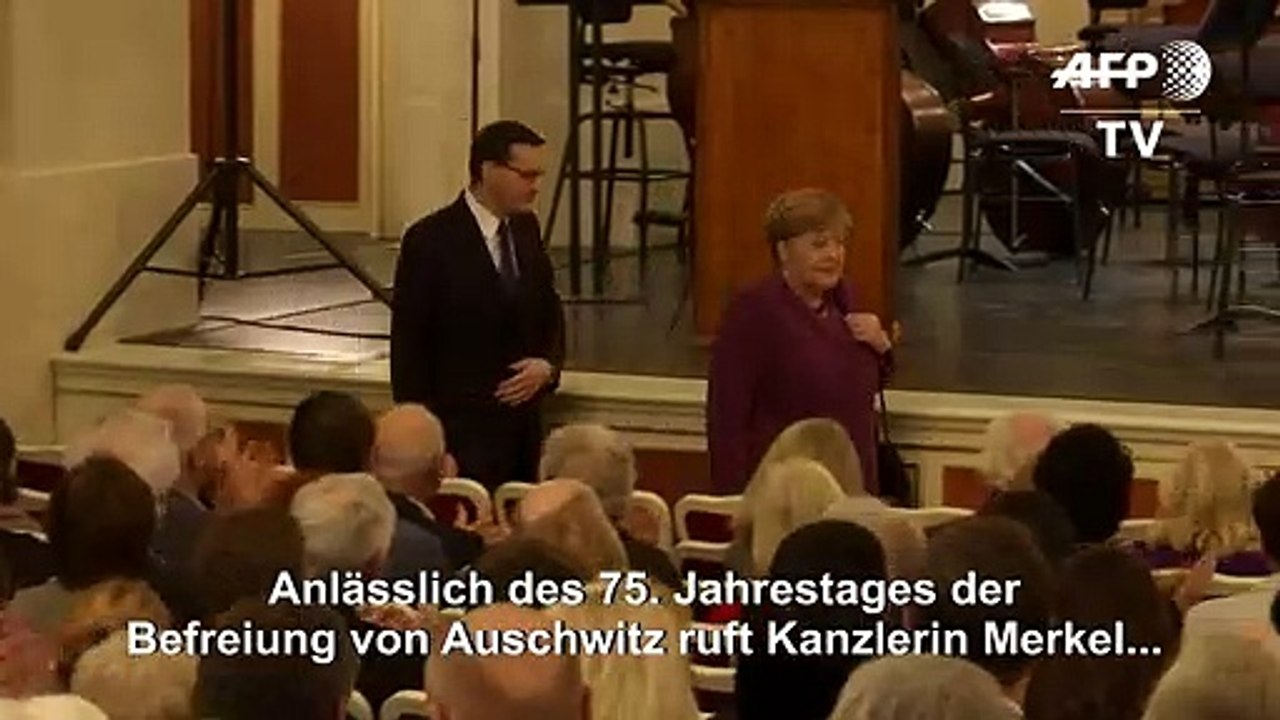 Merkel: Erinnerung an Auschwitz wach halten