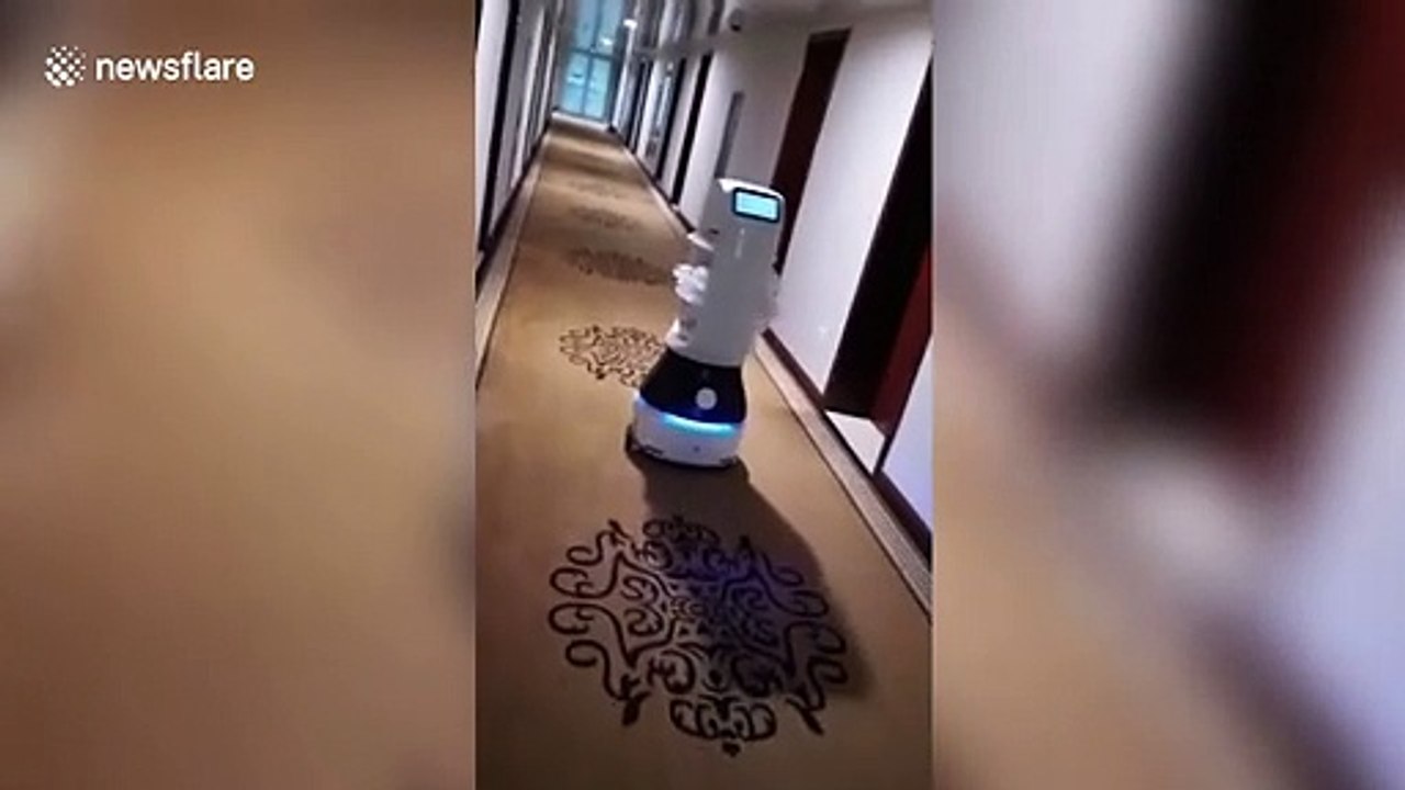 Robots used to deliver food to people quarantined in hotel to avoid