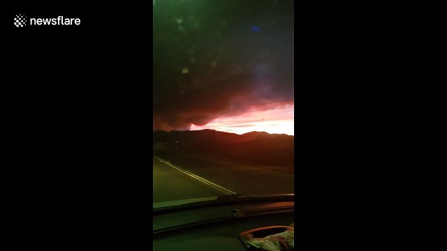 Aussie captures apocalyptic scenes as sky glows from bushfires