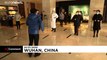 Quarantined hotel workers in Wuhan do exercises to stay active