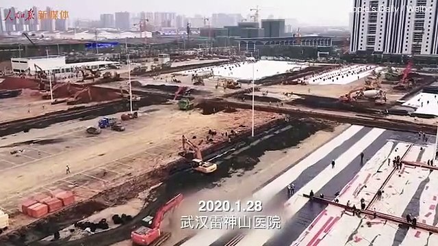 Heavy-duty vehicles build second coronavirus hospital in Wuhan