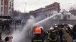 Violent clashes erupt between firefighters and police