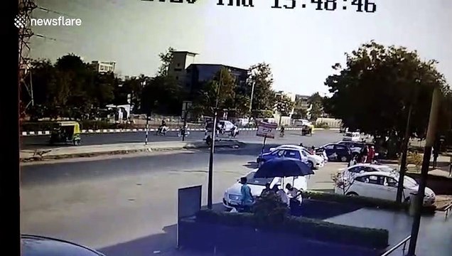 Driver escapes unharmed after speeding car loses control and flips over in western India