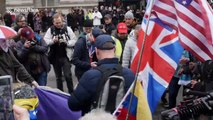 Brexit supporters burn EU flags next to Downing Street