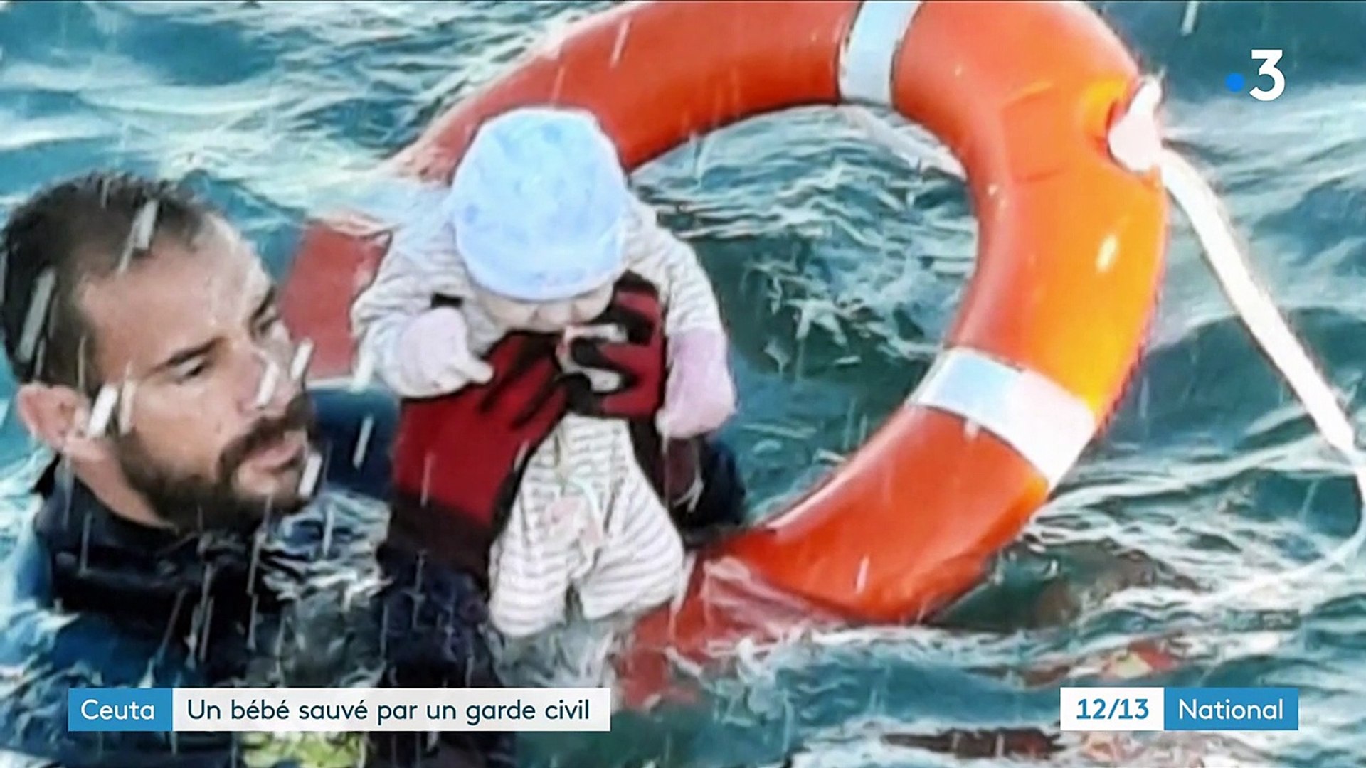 Migrants Un Bebe Sauve Par Un Garde Civil A Ceuta Video Dailymotion
