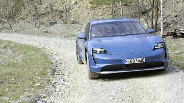 The new Porsche Taycan 4S Cross Turismo in Neptun blue Driving Video