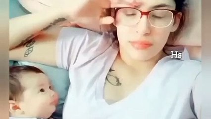 Adorable baby looking at her motherbjjjjm kidding