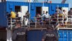 Hundreds of rescued migrants disembark from NGO ship in Sicily