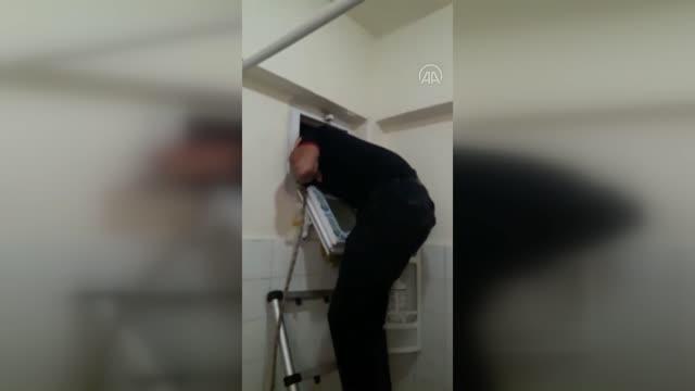 KAHRAMNAMARAŞ - Apartman boşluğuna düşen kediyi itfaiye kurtardı