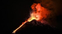 Lava flowing for several km after Mount Etna volcano erupted