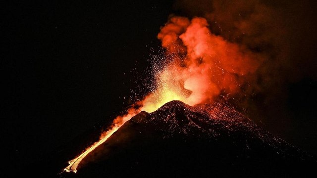 Lava flowing for several km after Mount Etna volcano erupted