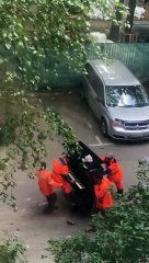 Moving Crew Transporting Piano and Having a Good Time