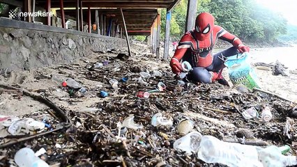 This Indonesian environmental activist dresses as Spider-Man to clean beach