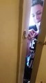 Girl Unlocks a Chain Door from the Outside