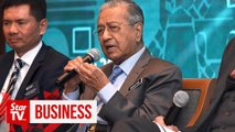 Oui, we're open for business, Dr M tells French firms