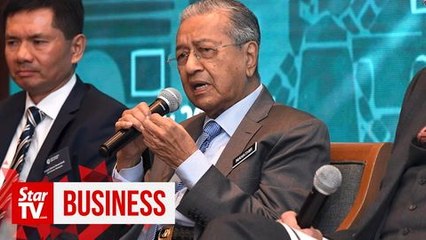 Oui, we're open for business, Dr M tells French firms