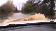 Incredible video shows how flooding caused by Storm Ciara trapped a family of four in their car