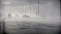 Cars and fire engine battered by crashing waves on Cleveleys seafront in wake of Storm Ciara