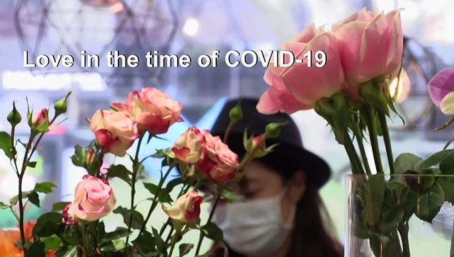 Where is the love? Virus fears dampen Valentine's Day in Shanghai