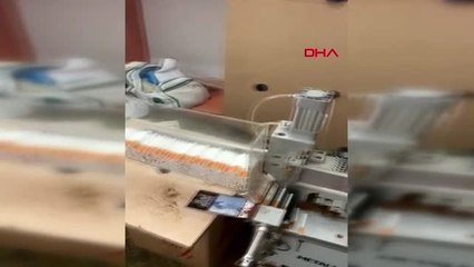 Evinde tütün sarma makinesi ile yakalandı