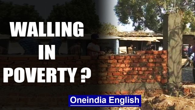 Ahmedabad civic body builds walls to conceal slums along Trump's way | OneIndia News