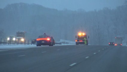 Car spins off road due to slippery conditions