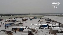 الثلوج تغمر مخيما للنازحين في إدلب
