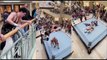 American wrestler PJ Hawx LEAPS ONTO OPPONENTS FROM MALL BALCONY