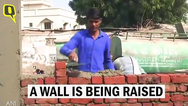 Another ‘Trump Wall’ Goes Up, To Hide Slums During His India Visit