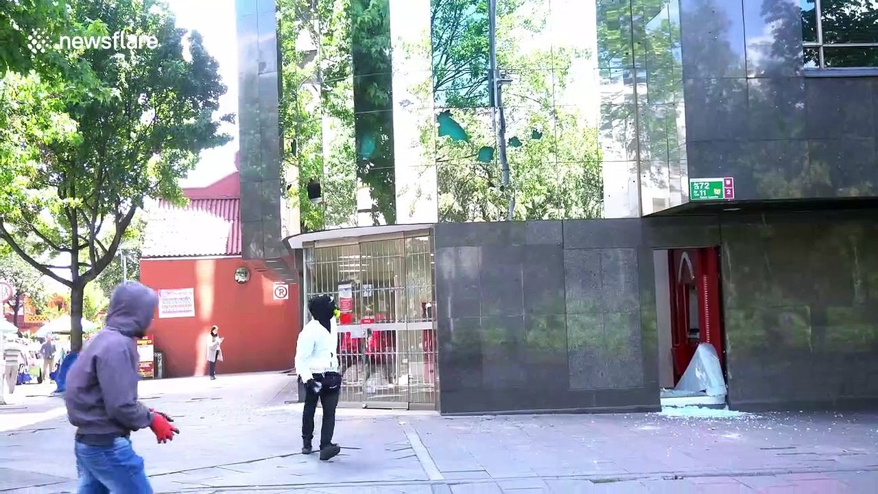 Colombian riot police clash with student protesters in Bogota