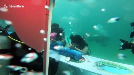 Thai couple get married in underwater ceremony for Valentine's Day