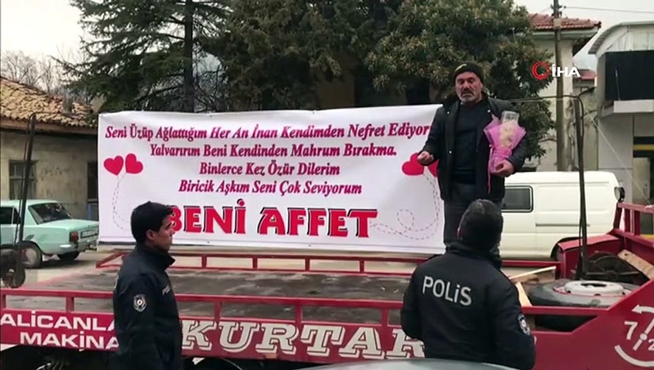Af dilemek için 'Biricik Aşkım' diye açtığı pankart sonrası karakola düştü