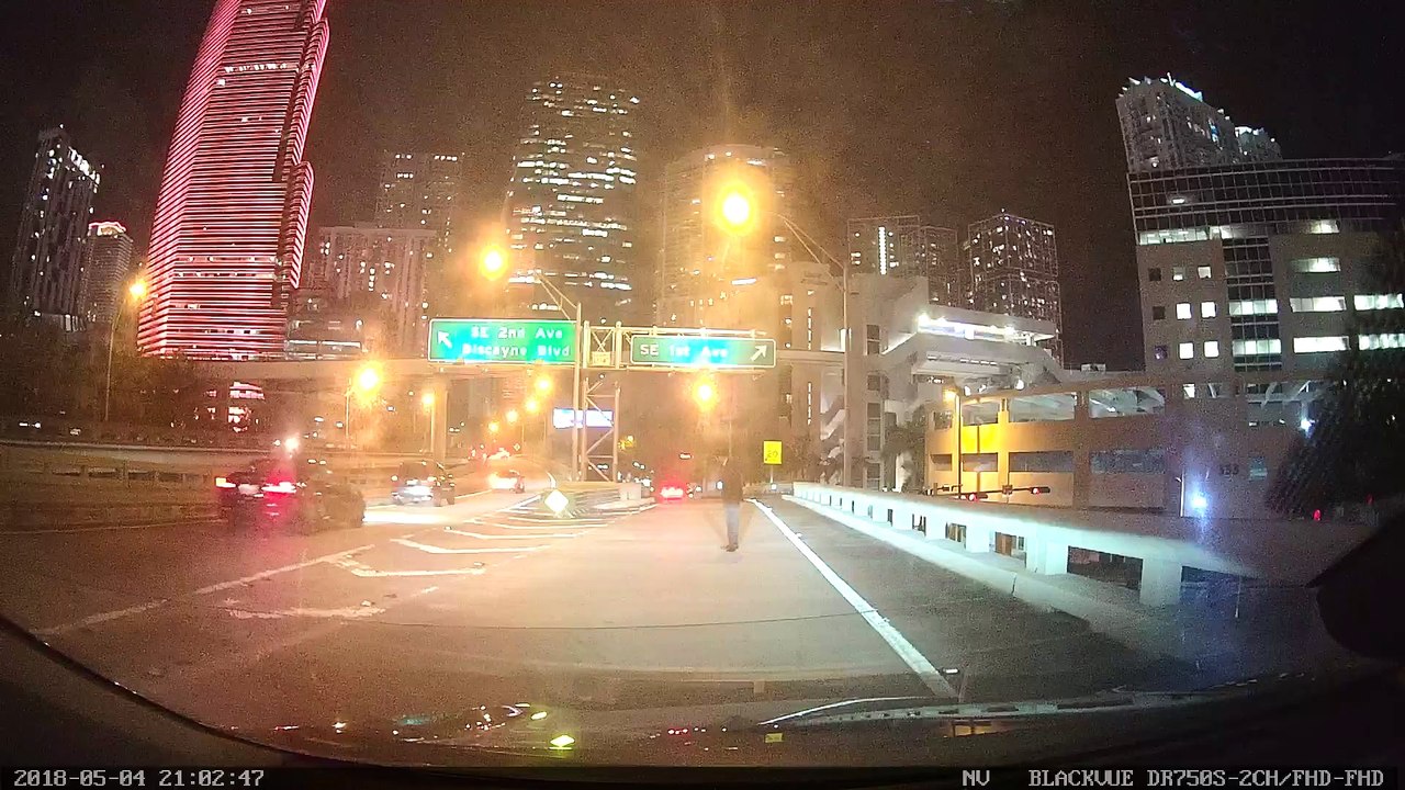 Strange Man Blocking Busy Freeway Exit