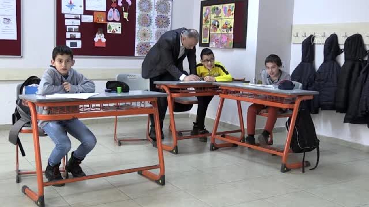 Özel öğrenciler "esnaf" yanında çalışarak sosyalleşiyor