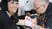 Fundraisers get tattoos to raise awareness of autism and raise money for KAYAKS at Pretty and Ink