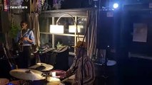 Jazz two-piece band jam to the sound of fire alarm in London venue