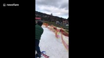 First time skier in Czechia tries to stop but hilariously runs into orange tape