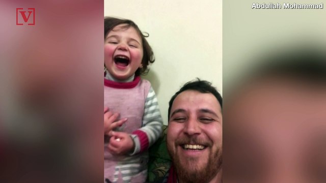 The Sweetest Giggle Ever: Syrian Dad Teaches Daughter to Laugh at Bombs to Cope with Fear