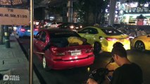 Tired Taxi Driver Naps On His Car Boot